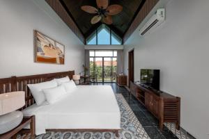 Ein Bett oder Betten in einem Zimmer der Unterkunft Coco Island Resort Ninh Binh