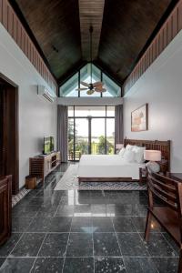 Ein Bett oder Betten in einem Zimmer der Unterkunft Coco Island Resort Ninh Binh