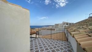 a view from the balcony of a building at Lanterne Magiche Ortigia Suites in Syracuse