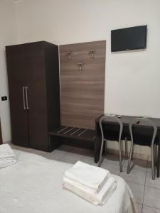 Postel nebo postele na pokoji v ubytování Hotel Salus
