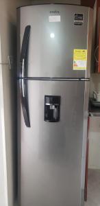 a stainless steel refrigerator in a kitchen at frente al mar en Cartagena in Cartagena de Indias