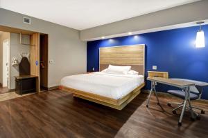 Postel nebo postele na pokoji v ubytování Tru By Hilton Syracuse-Camillus
