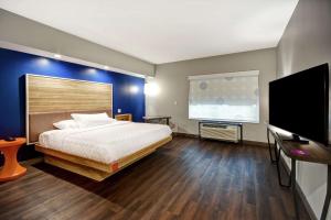 Postel nebo postele na pokoji v ubytování Tru By Hilton Syracuse-Camillus