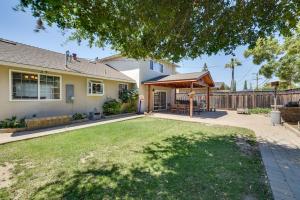 a house with a backyard with a lawn at Campbell Vacation Rental about 8 Mi to San Jose! in Campbell