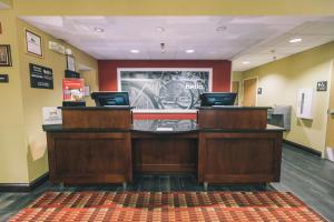 a lobby with a reception desk in a hospital at Hampton Inn Tallahassee-Central in Tallahassee