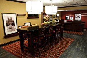 a dining room with a table and chairs at Hampton Inn Tallahassee-Central in Tallahassee