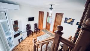 TV a/nebo společenská místnost v ubytování Dato's GuestHouse