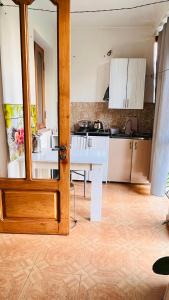 Kuchyň nebo kuchyňský kout v ubytování Dato's GuestHouse