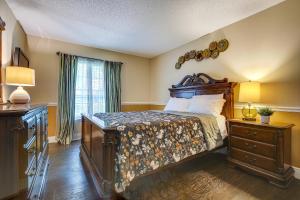 a bedroom with a bed and a dresser and a window at Near Golf and Beaches Coral Springs Home with Yard! in Coral Springs +23 photos