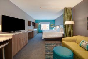 TV a/nebo společenská místnost v ubytování Home2 Suites By Hilton Tucson Downtown