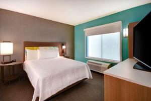 Postel nebo postele na pokoji v ubytování Home2 Suites By Hilton Tucson Downtown