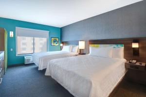 Postel nebo postele na pokoji v ubytování Home2 Suites By Hilton Tucson Downtown