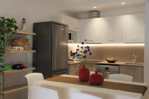 Кухня или мини-кухня в Villaggio Mare Blu
