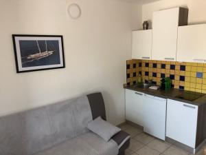 Kuchyň nebo kuchyňský kout v ubytování Appartements Antunovic