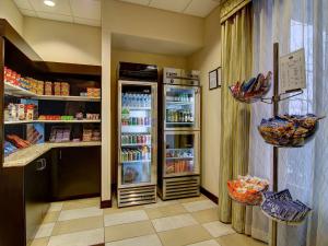 a store with an open refrigerator in a room at Hampton Inn Washington-Dulles International Airport South in Chantilly