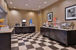a hair salon with a checkered floor at Hampton Inn & Suites Woodward in Woodward