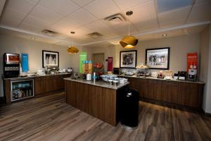 a barber shop with a counter in a room at Hampton Inn & Suites Truro, NS in Truro