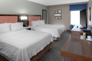 Postel nebo postele na pokoji v ubytování Hampton Inn Woodbridge