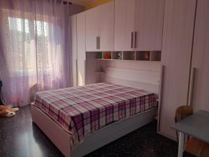 Katil atau katil-katil dalam bilik di Casa dei Baiocchi