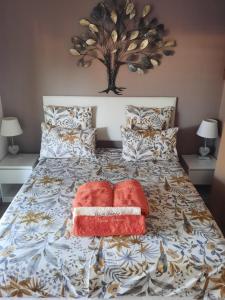 Ліжко або ліжка в номері Chambre d'hôtes dans Villa Diane