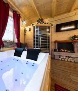 Fotografie z fotogalerie ubytování AL RANCH WELLNESS CADORE DOLOMITI APARTMENTS vicino Cortina Olimpiadi 2026 e Misurina Tre Cime Lavaredo v destinaci Pieve di Cadore