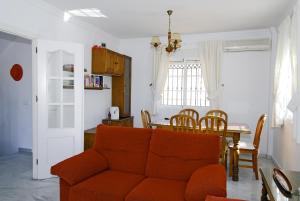 Uma área de estar em Apartamentos HC Burriana Playa