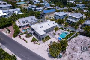 an aerial view of a house on the beach at Bean Point Residence in Anna Maria