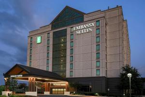 a building with the embassy suites sign on it at Embassy Suites by Hilton Chicago Lombard in Lombard