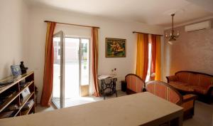 Posezení v ubytování Apartments and Rooms Degra