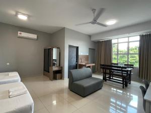 Postel nebo postele na pokoji v ubytování Reno Hotel Ipoh + 37 fotografií