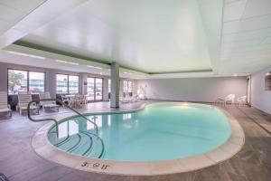 a large swimming pool in a large room with at Hampton Inn Fishkill in Fishkill