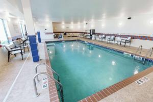 a large swimming pool in a hotel room at Hampton Inn Bismarck in Bismarck