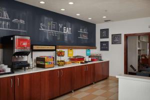 a fast food restaurant with a chalkboard on the wall at Hampton Inn Helena in Helena