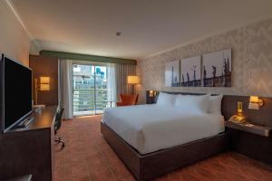 a hotel room with a bed and a television at DoubleTree by Hilton San Diego Downtown in San Diego