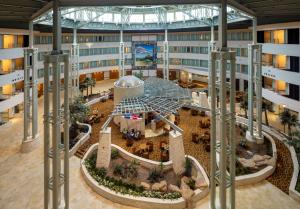 an aerial view of arium of a building at Hilton Austin Airport in Austin