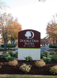 a sign for the dooth office of the university at DoubleTree by Hilton Huntsville-South in Huntsville