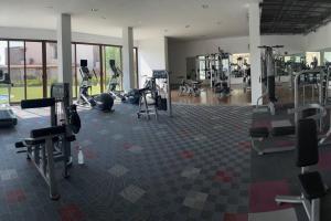 a gym with several treadmills and machines at Luxury at a great price in San Miguel in San Miguel de Allende
