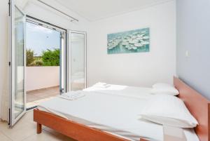 Кровать или кровати в номере Europe Villas Collection +28 фотографий