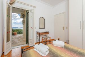 A bed or beds in a room at Villa Sofia