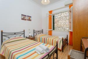A bed or beds in a room at Villa Sofia