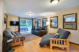 Seating area sa Brantingham Cottage with Fire Pit and Forested Views!