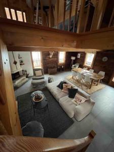 an overhead view of a living room in a cabin at Châlet Champex-lac in Champex