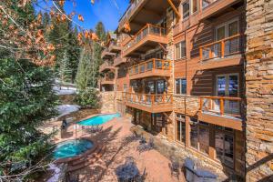 an aerial view of an apartment building with a swimming pool at Timbers & Lone Eagle by Keystone Resort in Keystone