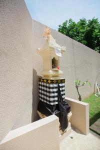 Domácí mazlíčci ubytovaní s hosty v ubytování Donguri House Bali
