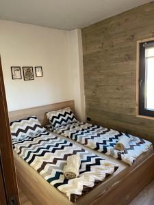 Postel nebo postele na pokoji v ubytování Mavrovo Apartment