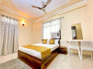 Säng eller sängar i ett rum på Visit Kashi Stay