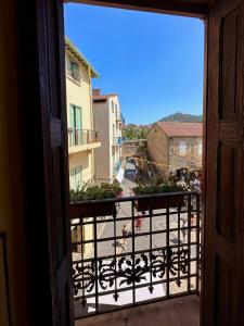 a view from a window of a balcony at Lumières à Collioure in Collioure
