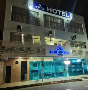 a hotel with a sign on the front of it at Bellonorte Hotel in Altamira