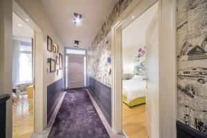 Postel nebo postele na pokoji v ubytování Cinque Rooms