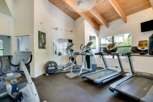 a gym with treadmills and cardio equipment in a room at Tucson Oasis Heated Pool, Tennis Court, Hiking! in Tucson
